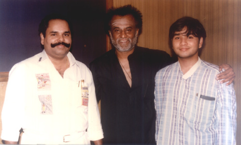 Mr.K.T.Kunjumon and his son Ebi Kunjumon having a snap with Super Star Rajinikanth ktk-actors (4)
